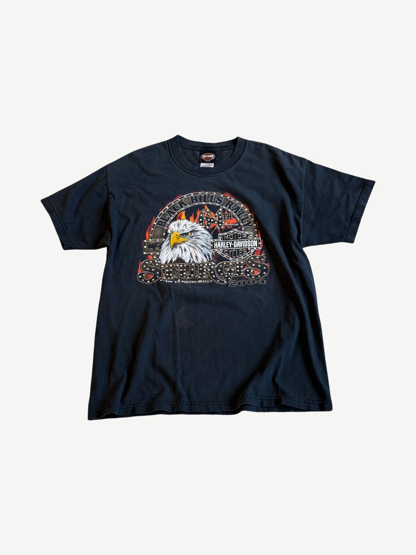 Vintage Harley Davidson Sturgis Black Hills Rally tee in black with eagle and rhinestone studded graphic.