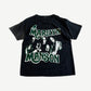 Vintage Marilyn Manson black tee front with green bubble logo and grayscale band member photo collage print.