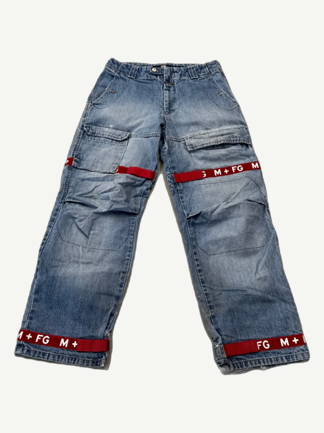 Vintage Marithe Francois Girbaud light wash baggy jeans front view with signature red FG knee ribbon straps