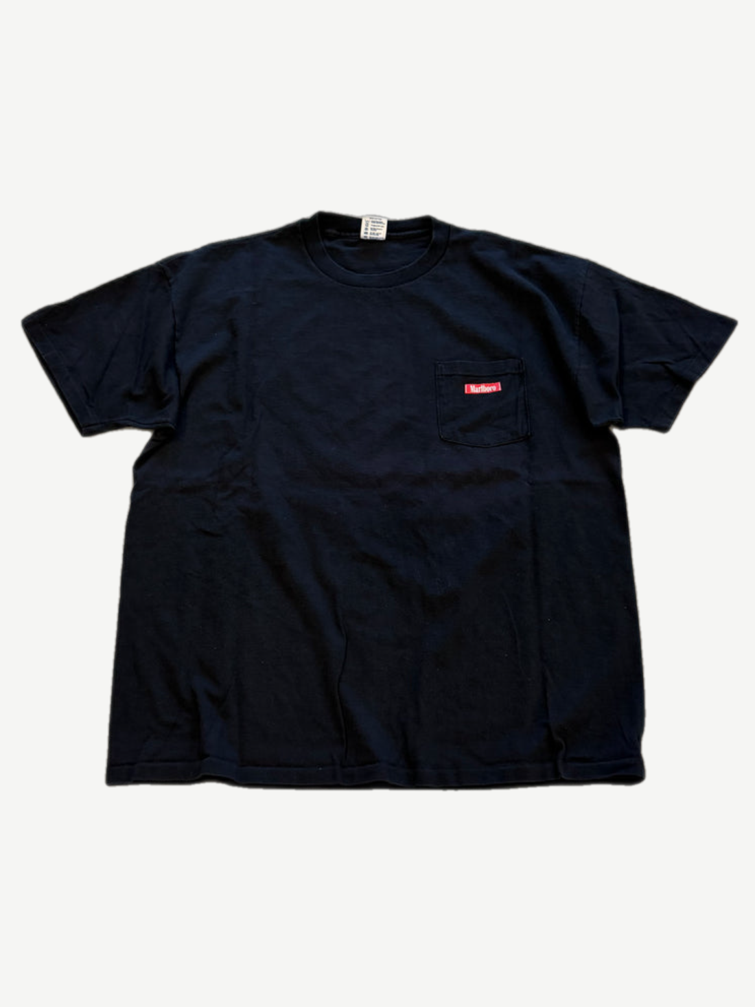 Vintage Marlboro black tee front, small red Marlboro chest pocket patch with short sleeves and crew neck.