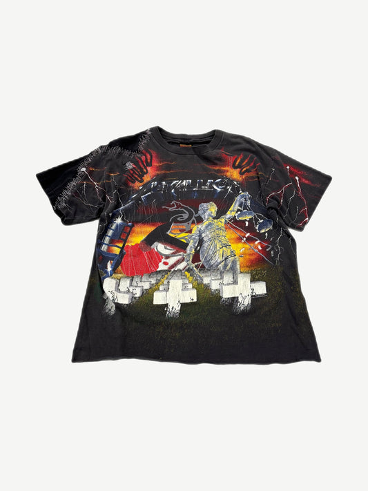 Vintage Metallica all over print tee front with Justice statue, lightning bolts and white crosses graphic