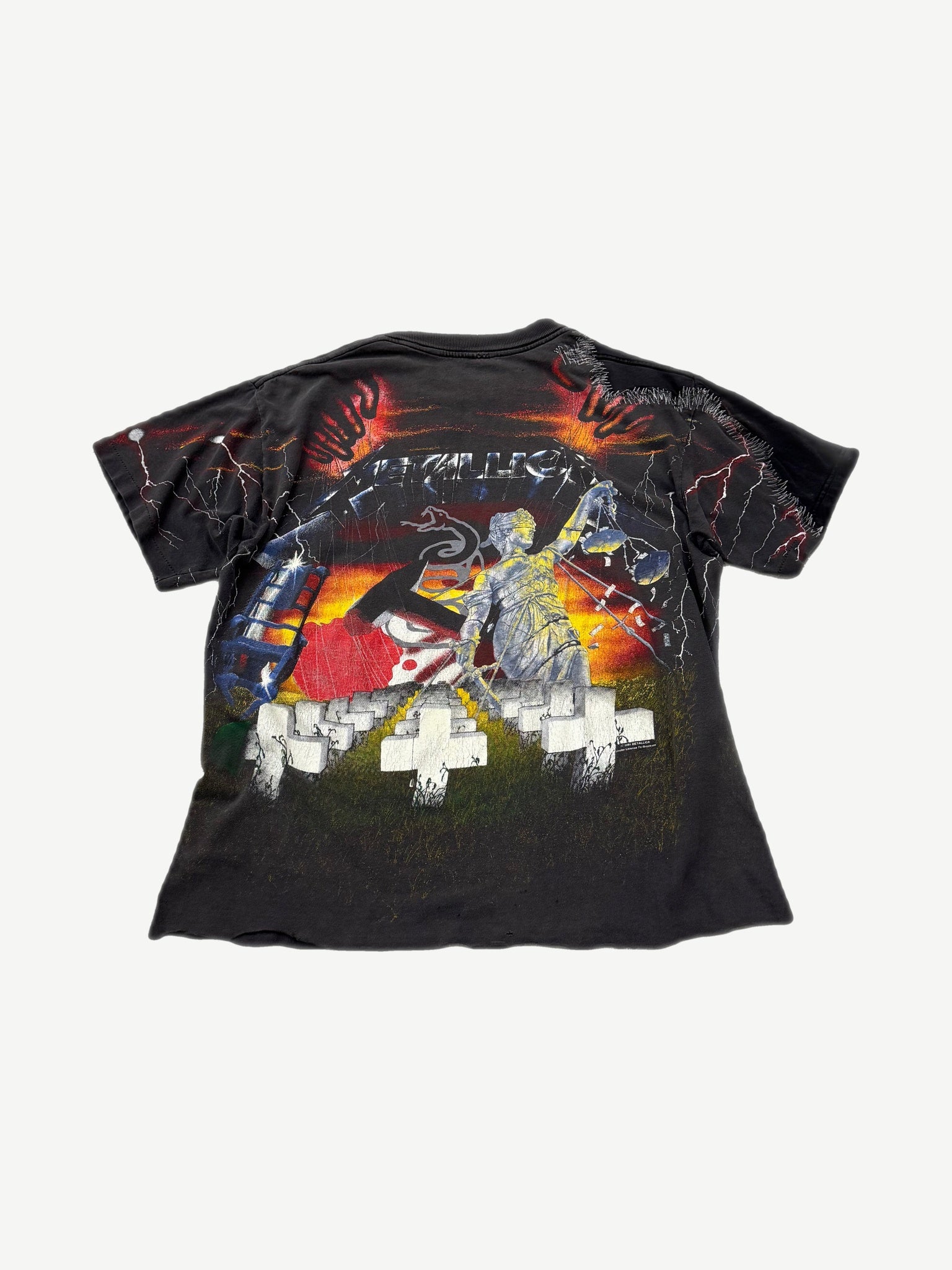 Vintage Metallica all over print tee back with faded Justice statue, lightning and tombstone artwork