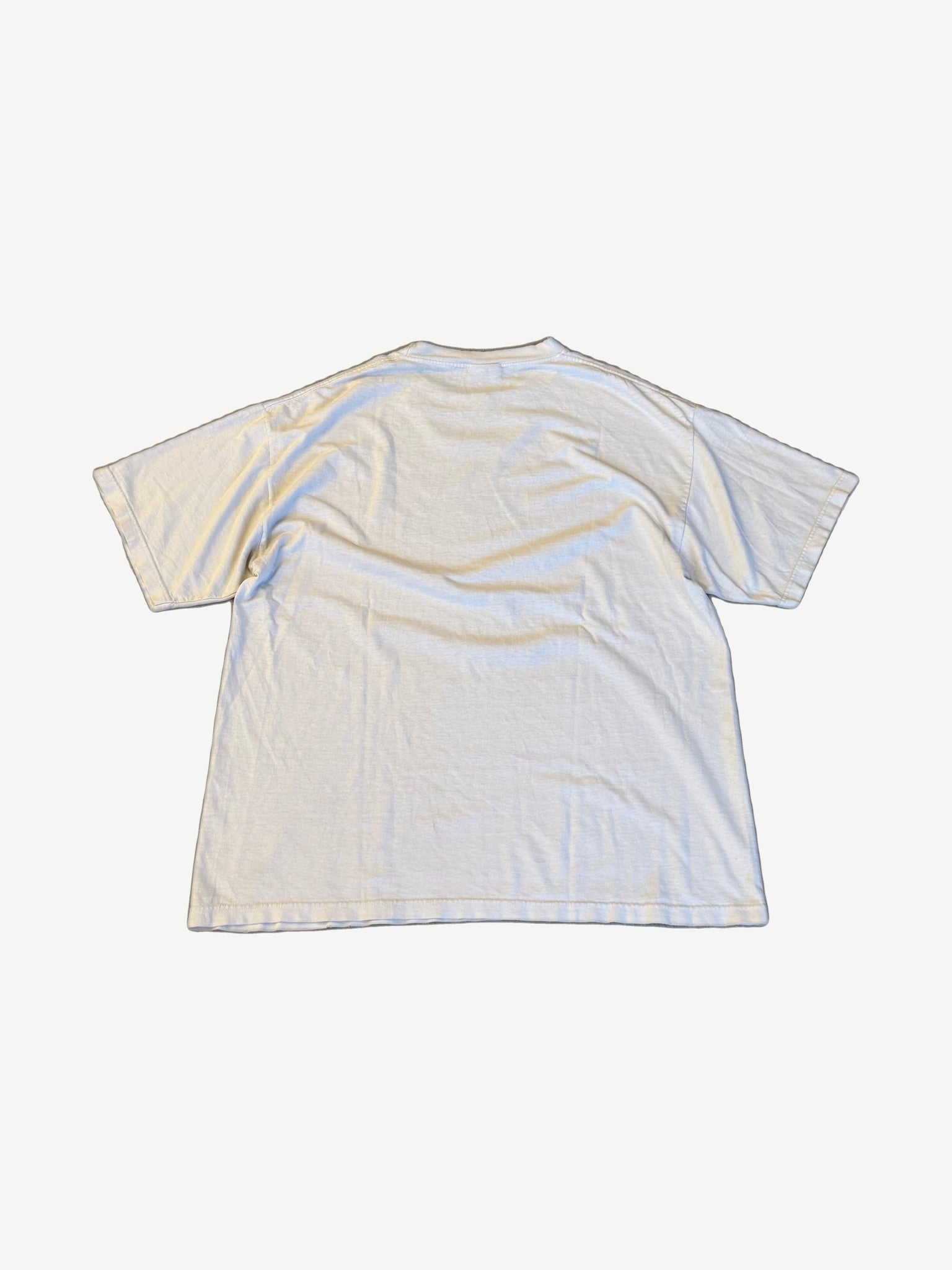 Vintage Metallica M2K tour tee back view in aged cream cotton with relaxed boxy vintage cut.