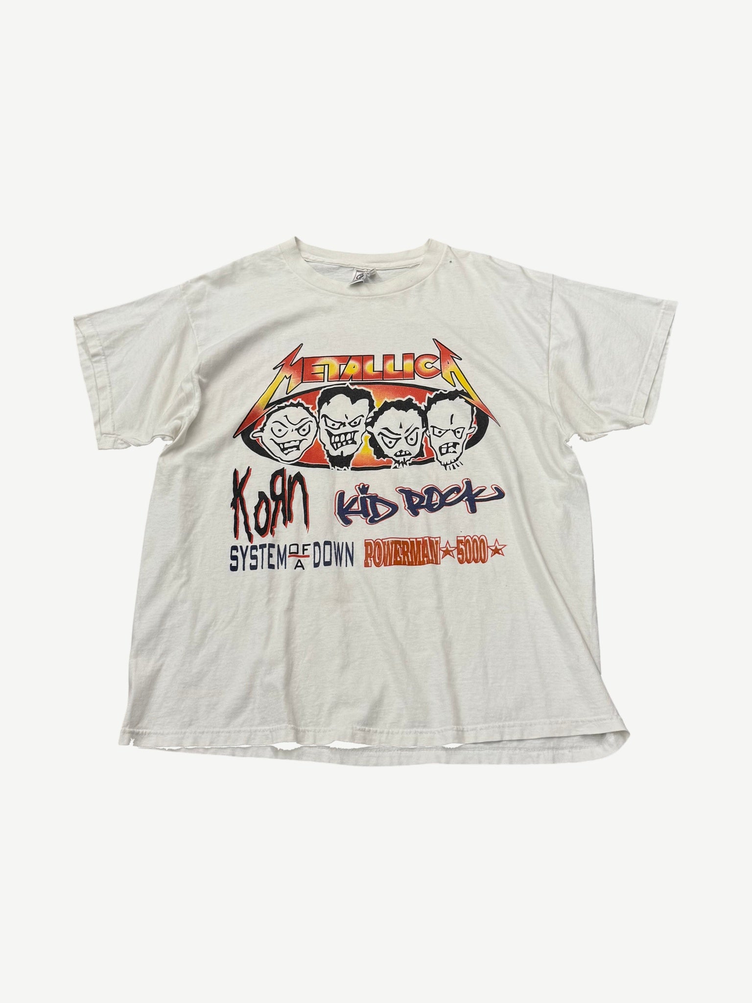 Vintage Metallica Summer Sanitarium 2000 tour tee front with skull graphic, flame artwork and band lineup.