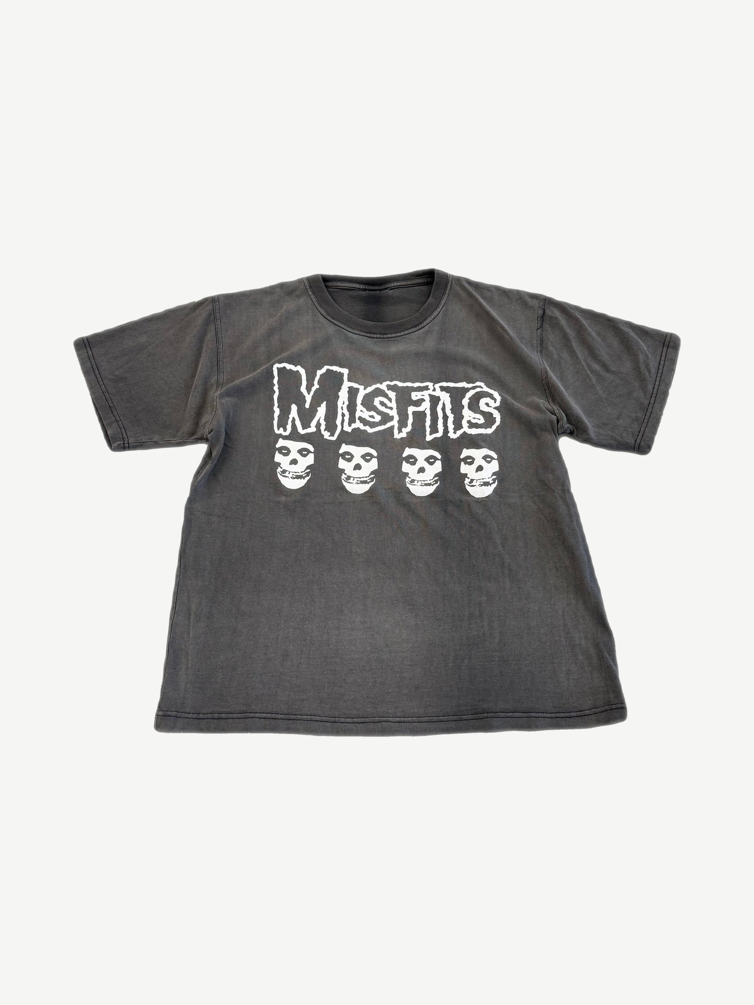Vintage Misfits Fiend skull tee, faded black with white logo and four-skull punk band graphic