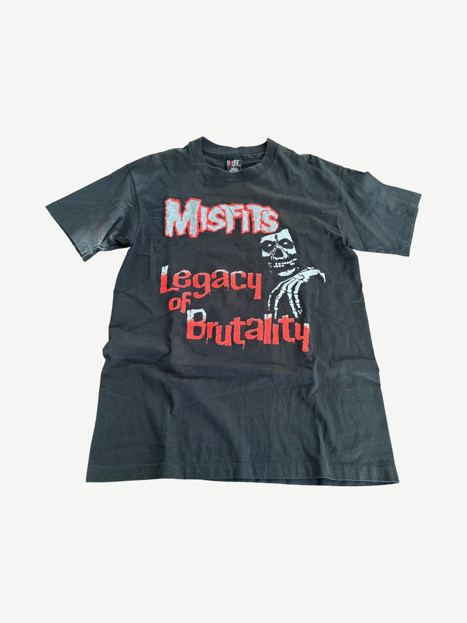 Vintage Misfits black tee, back view with faded album tracklist print and worn cotton texture