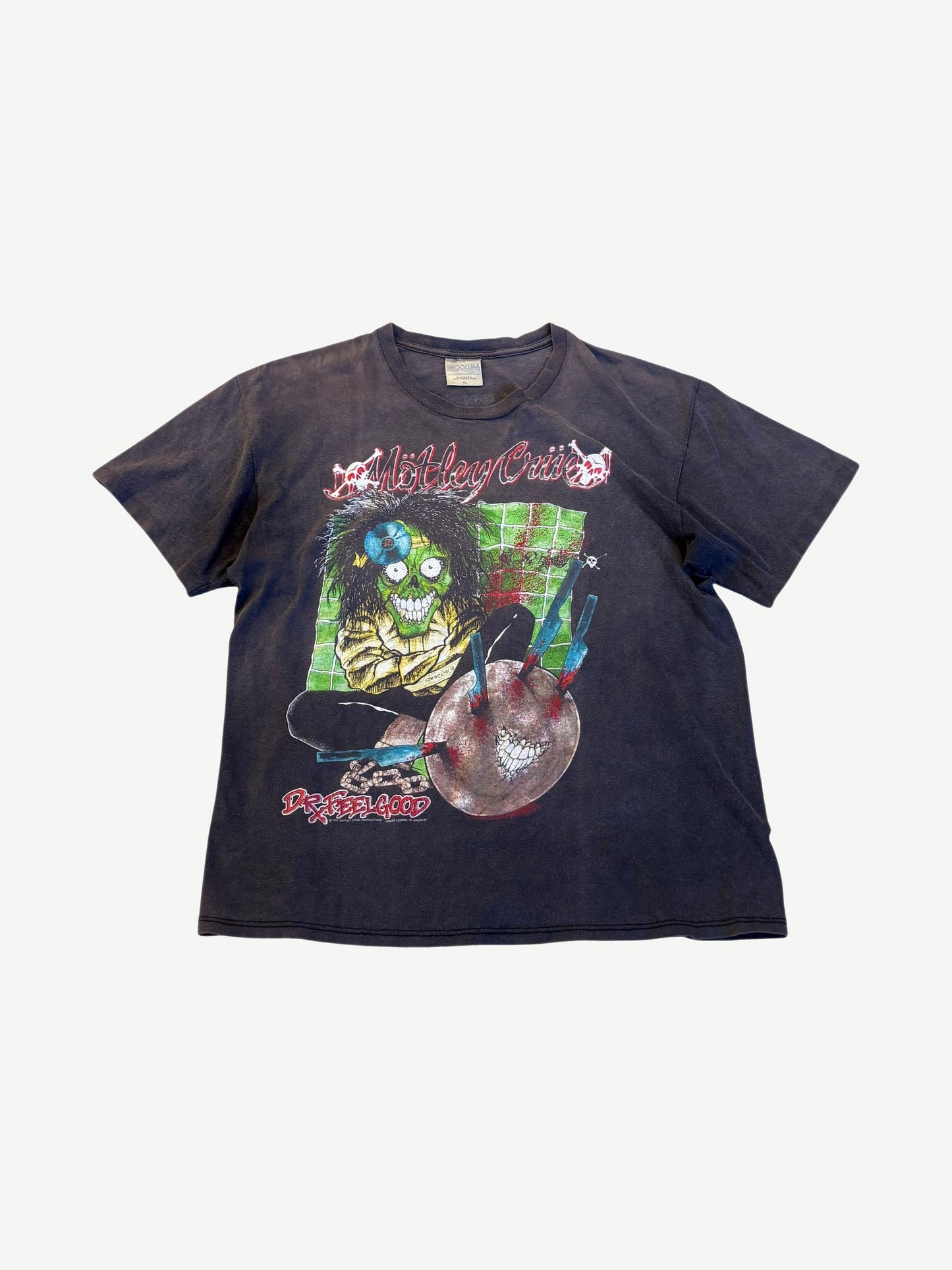 Vintage Motley Crue Dr. Feelgood faded black tour tee front with cartoon dealer pills and syringe graphic