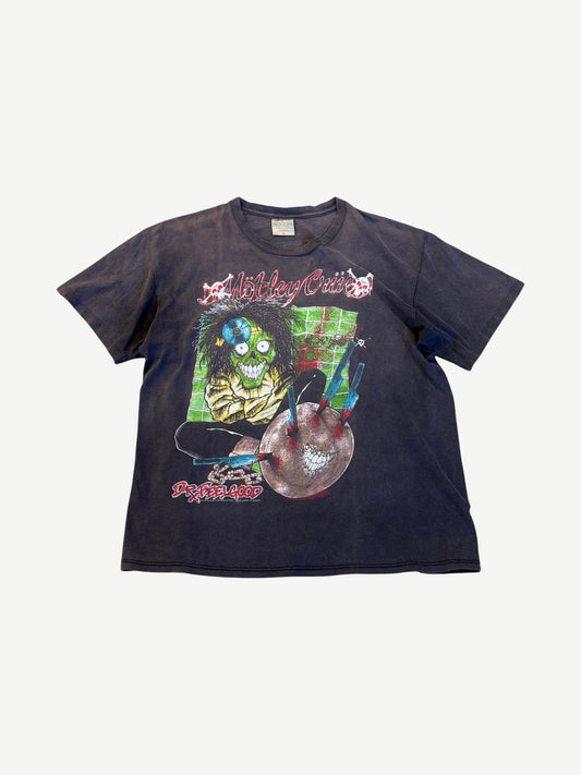 Vintage Motley Crue Dr. Feelgood faded black tour tee front with cartoon dealer pills and syringe graphic