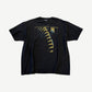 Vintage Nine Inch Nails Now I'm Nothing tee in black with gold ribcage graphic and band logo on chest.