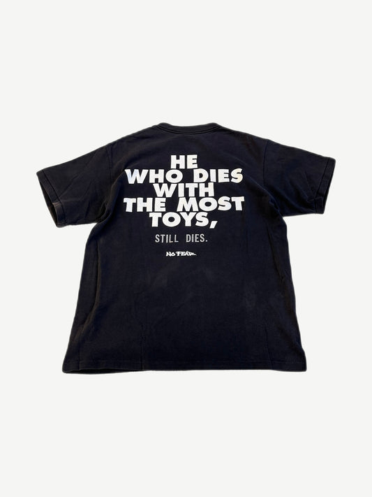 Vintage No Fear black tee back with bold He Who Dies With The Most Toys Still Dies slogan print
