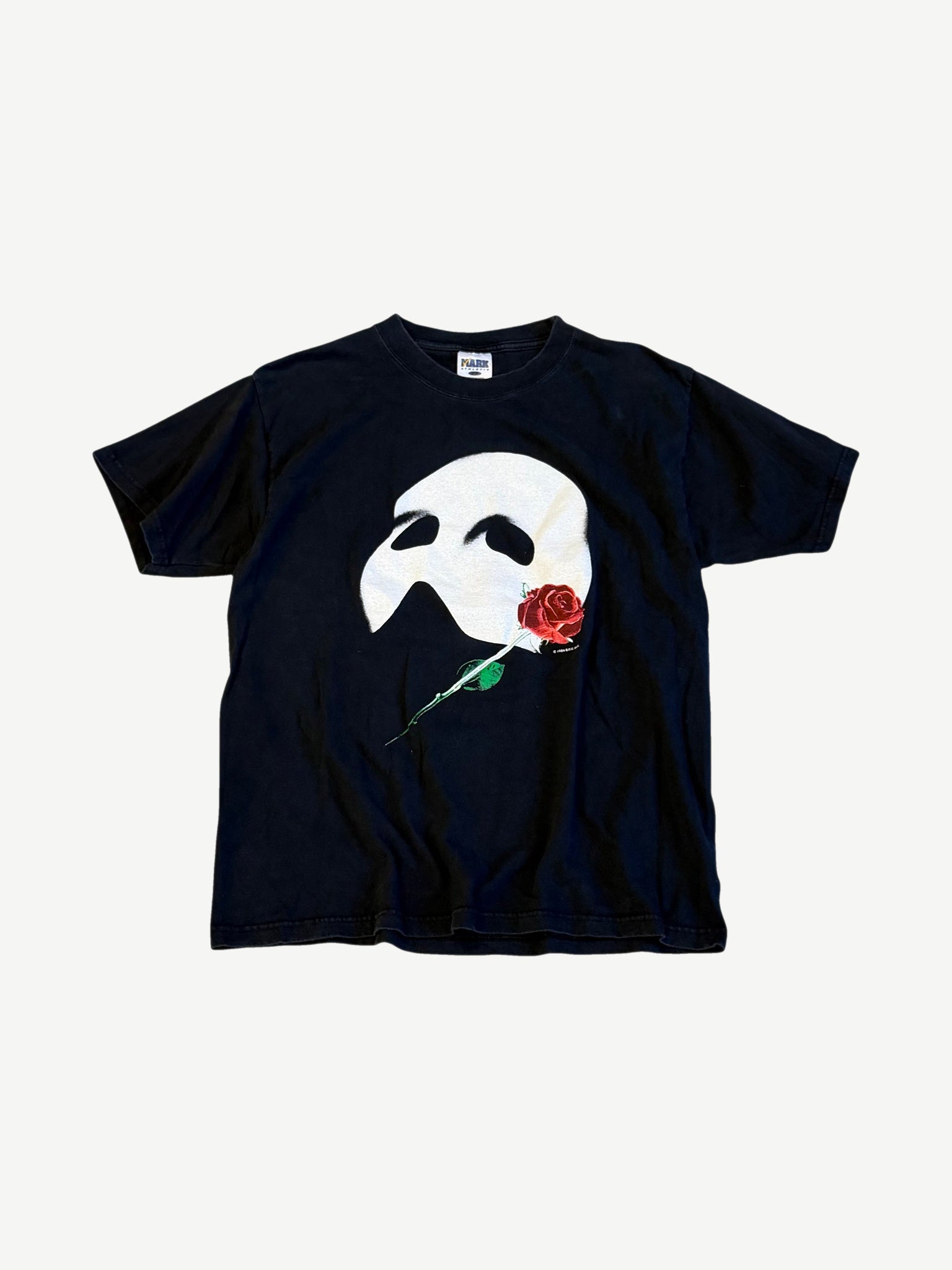 Vintage Phantom of the Opera black tee front with iconic white half-mask and single red rose musical graphic print.