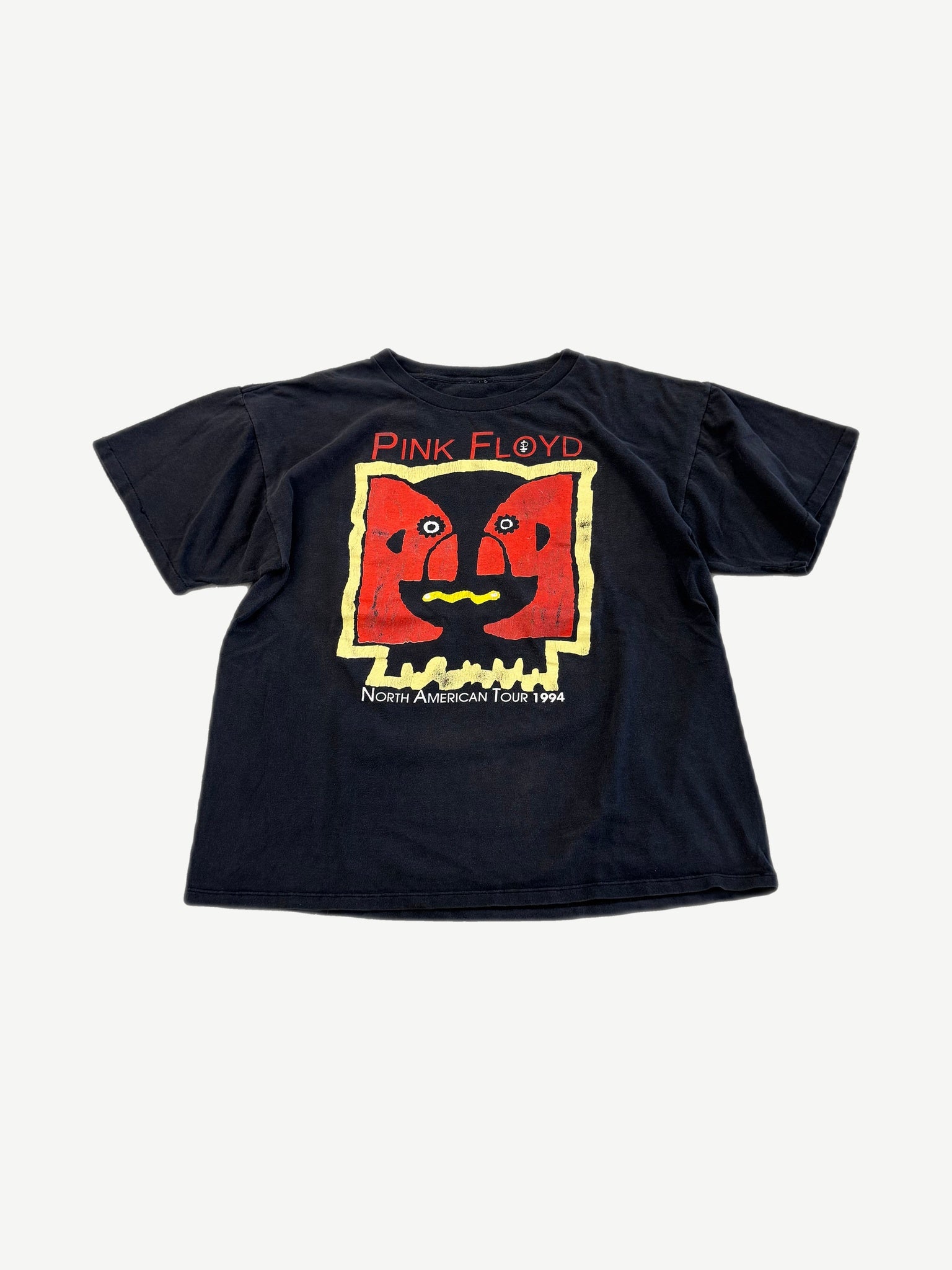 Vintage Pink Floyd Division Bell 1994 tour tee in black with red two-face album graphic on front.