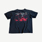 Vintage Pink Floyd The Wall tee back view with handwritten title text and red schoolmaster figure print