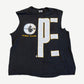 Vintage Public Enemy black cutoff tee front with crosshairs target logo, yellow PE block letters and raw sleeves.