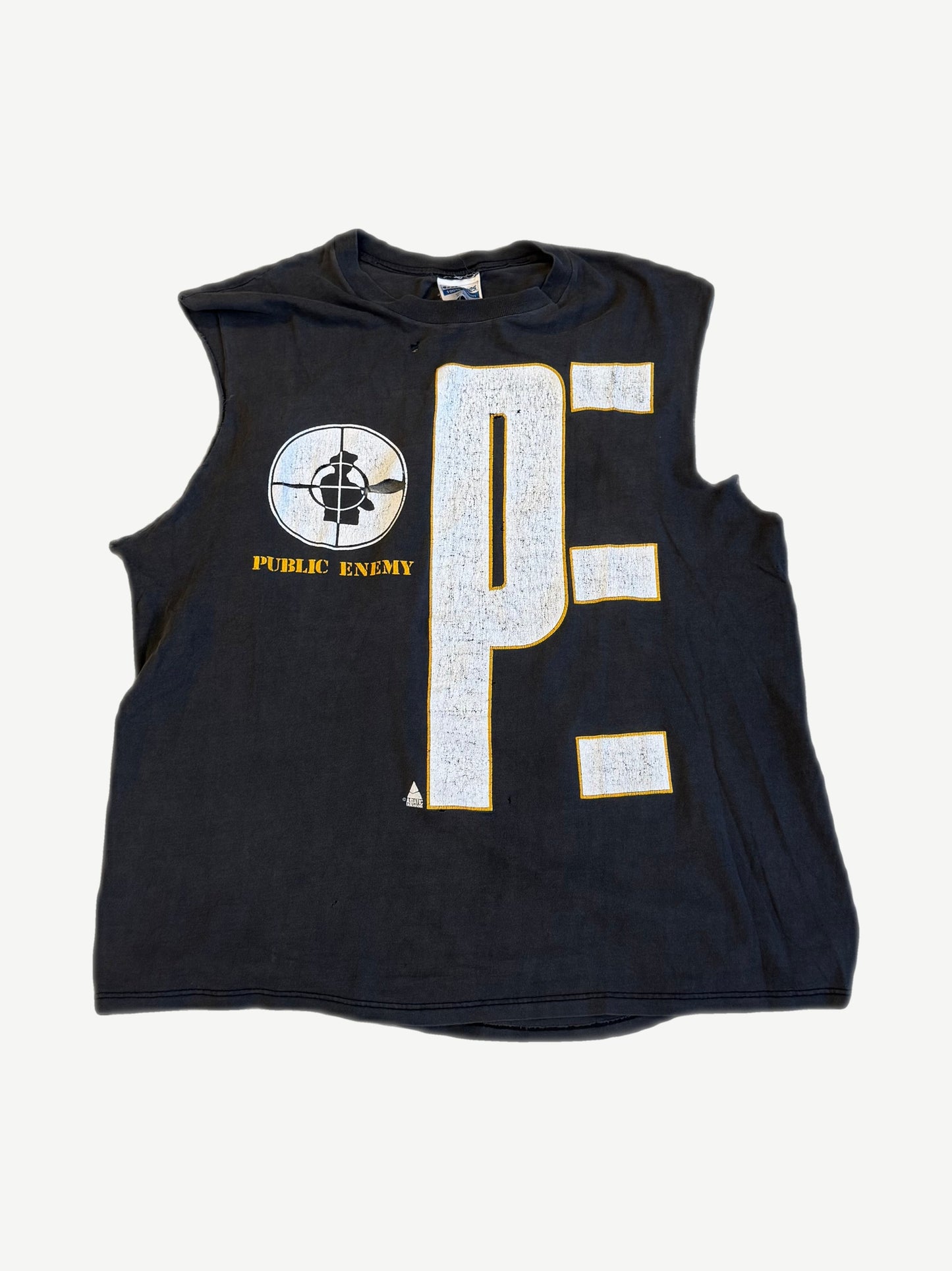Vintage Public Enemy black cutoff tee front with crosshairs target logo, yellow PE block letters and raw sleeves.