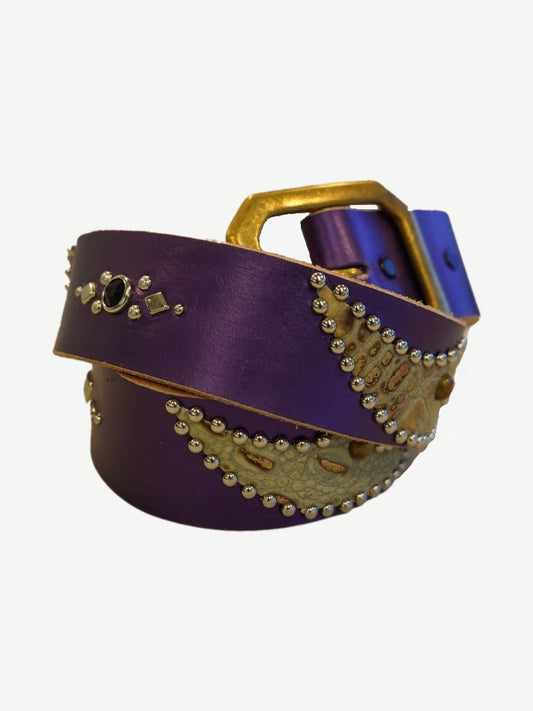 Vintage iridescent purple leather belt with silver stud trim, snakeskin appliques and brass buckle, coiled