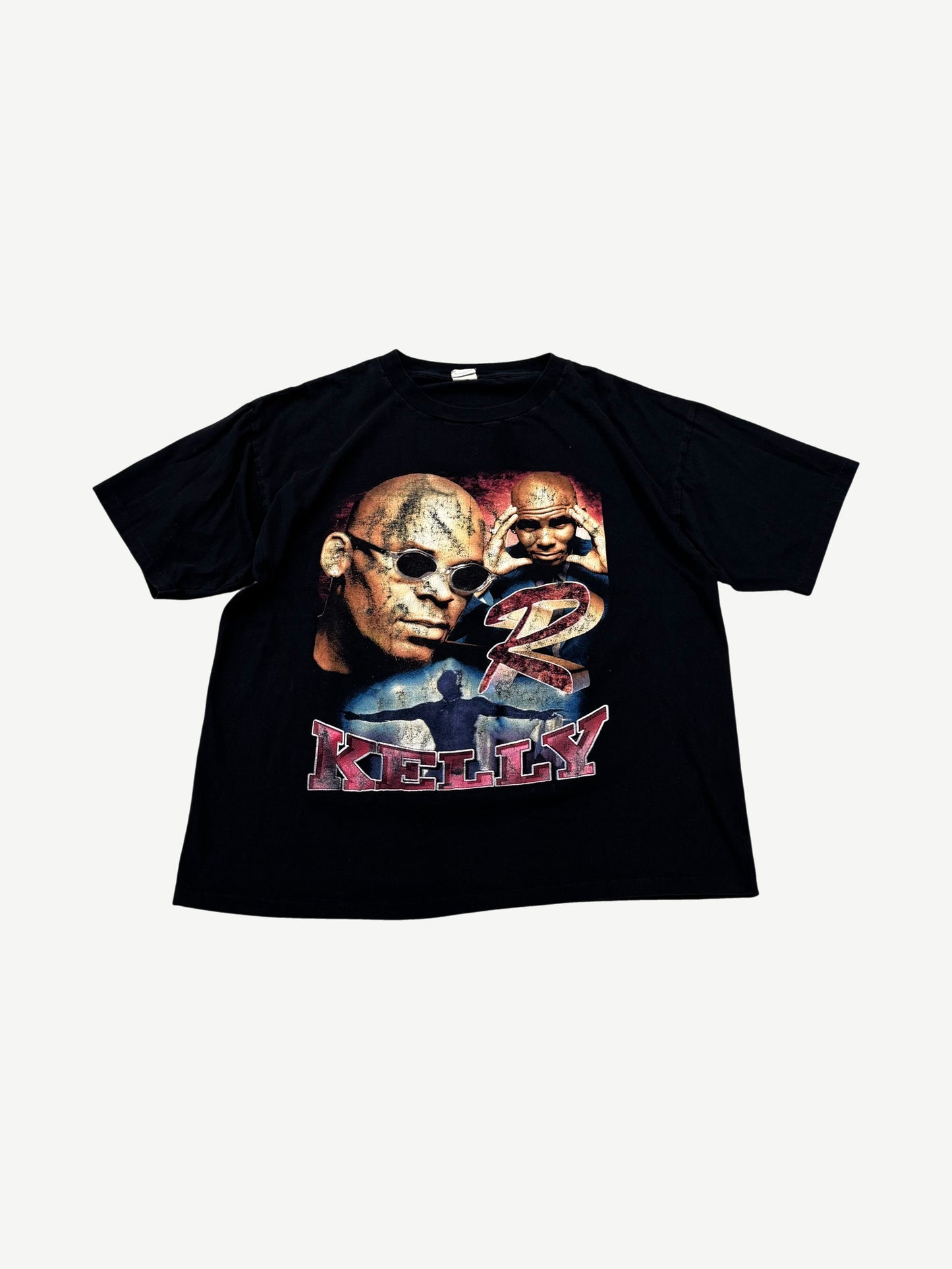 Vintage R Kelly black rap tee front with bold portrait graphic and red Kelly script across the chest.