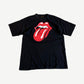 Vintage Rolling Stones black band tee with iconic red tongue and lips logo centered on chest