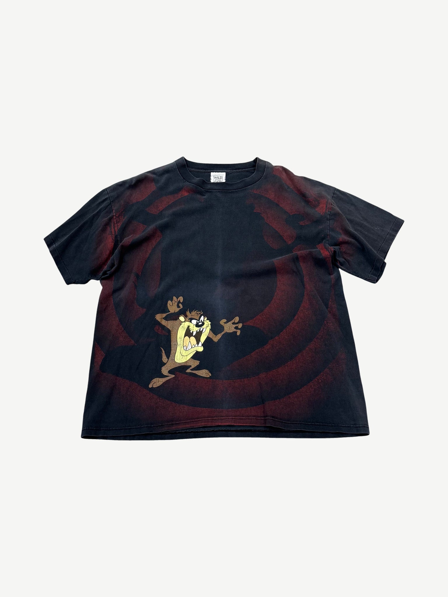 Vintage Looney Tunes Taz black tee with all-over print of Tasmanian Devil character