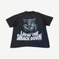 Vintage WWF The Rock tee front, faded black with grey Brahma bull print and Layin The Smack Down text.
