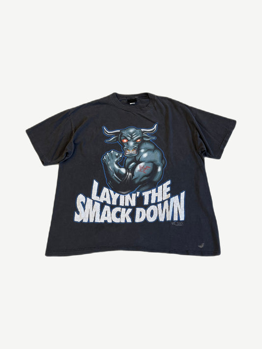 Vintage WWF The Rock tee front, faded black with grey Brahma bull print and Layin The Smack Down text.