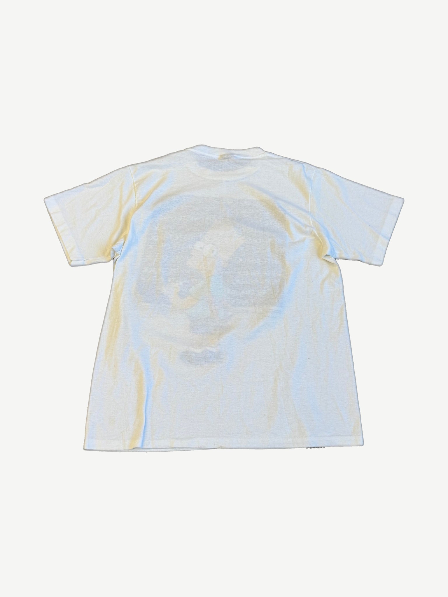 Back of vintage Simpsons white tee with print bleeding through and lightly stained vintage cotton wash