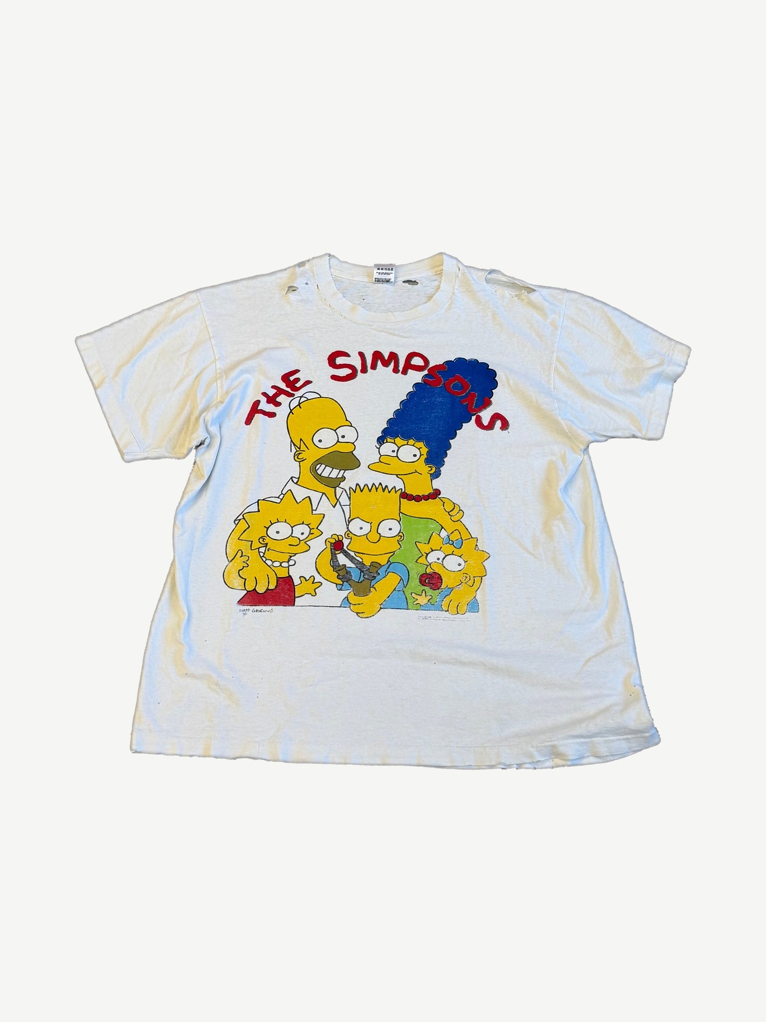 Vintage The Simpsons white tee with red wordmark and family portrait of Homer, Marge, Bart, Lisa, Maggie.