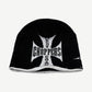 Vintage West Coast Choppers black ribbed beanie with white embroidered iron cross logo on cuff.