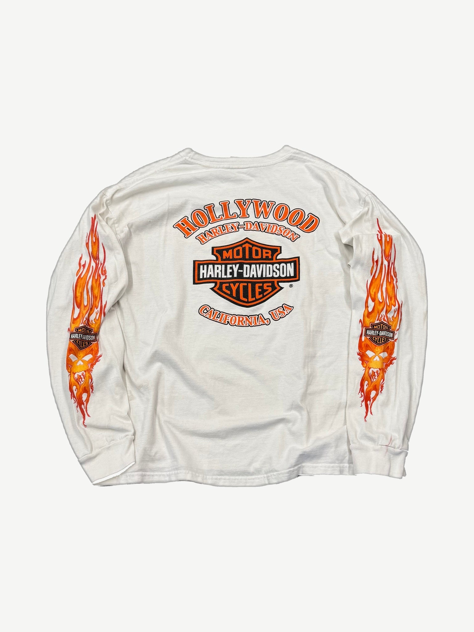 Vintage Harley-Davidson Hollywood California longsleeve back print with bar-and-shield logo and flame sleeve graphics.