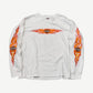 Vintage Harley-Davidson white longsleeve tee with orange flame bar-and-shield chest print and flaming skull sleeves.