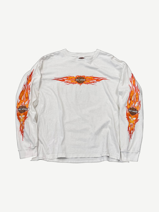 Vintage Harley-Davidson white longsleeve tee with orange flame bar-and-shield chest print and flaming skull sleeves.