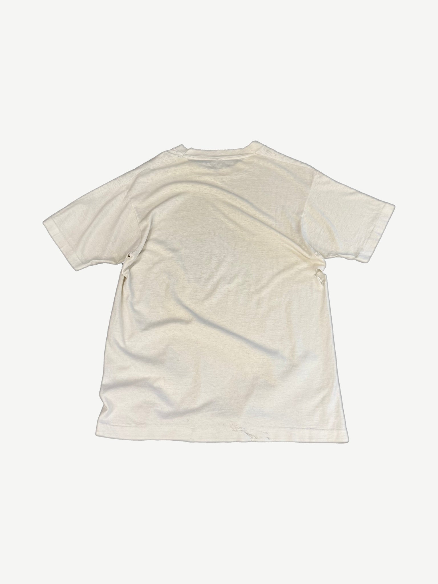 Vintage white Harley Davidson Sturgis tee blank back view with naturally aged short-sleeve cotton body