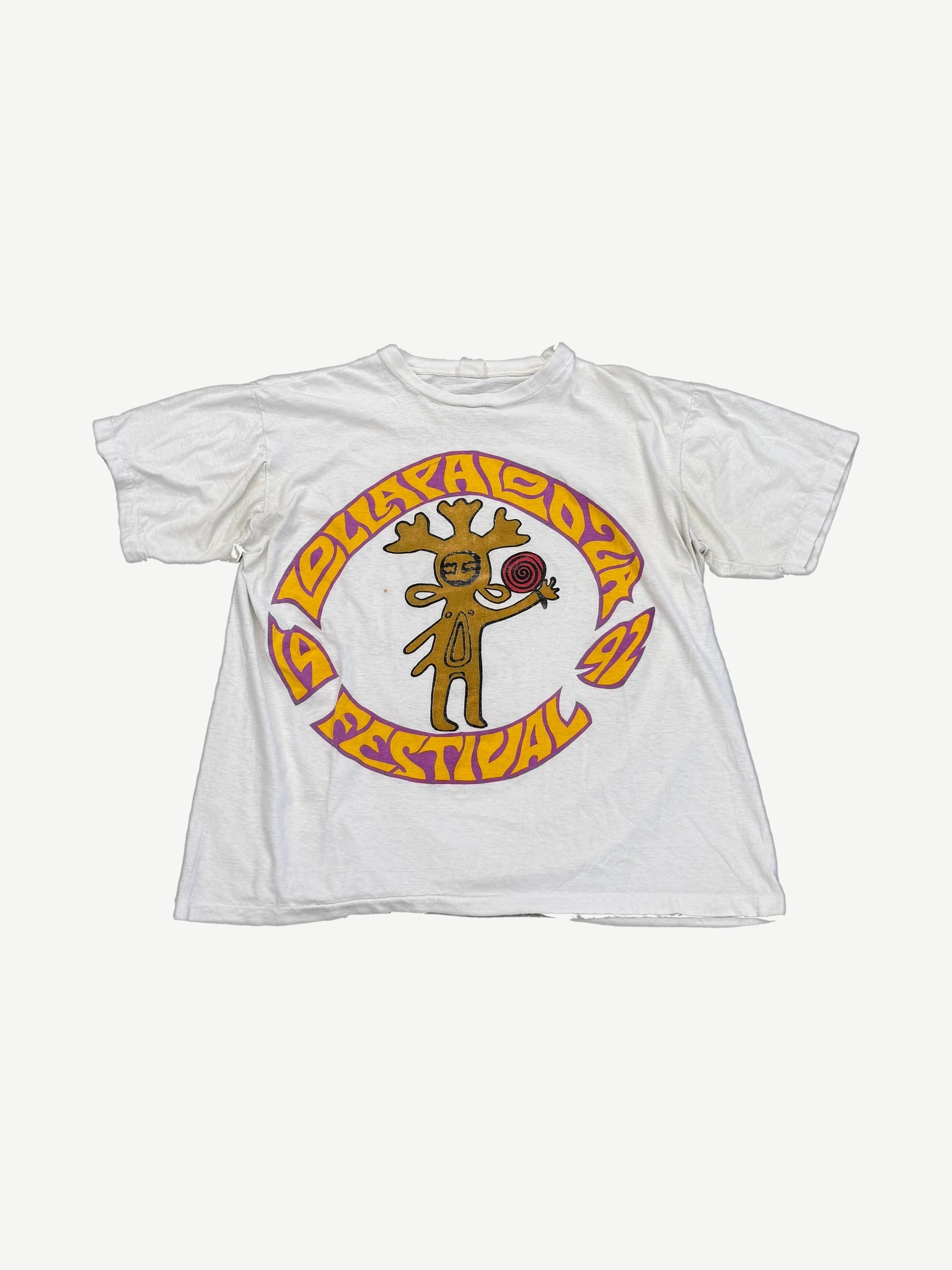 Vintage white Lollapalooza 1992 festival tee front with psychedelic antlered figure circular festival graphic
