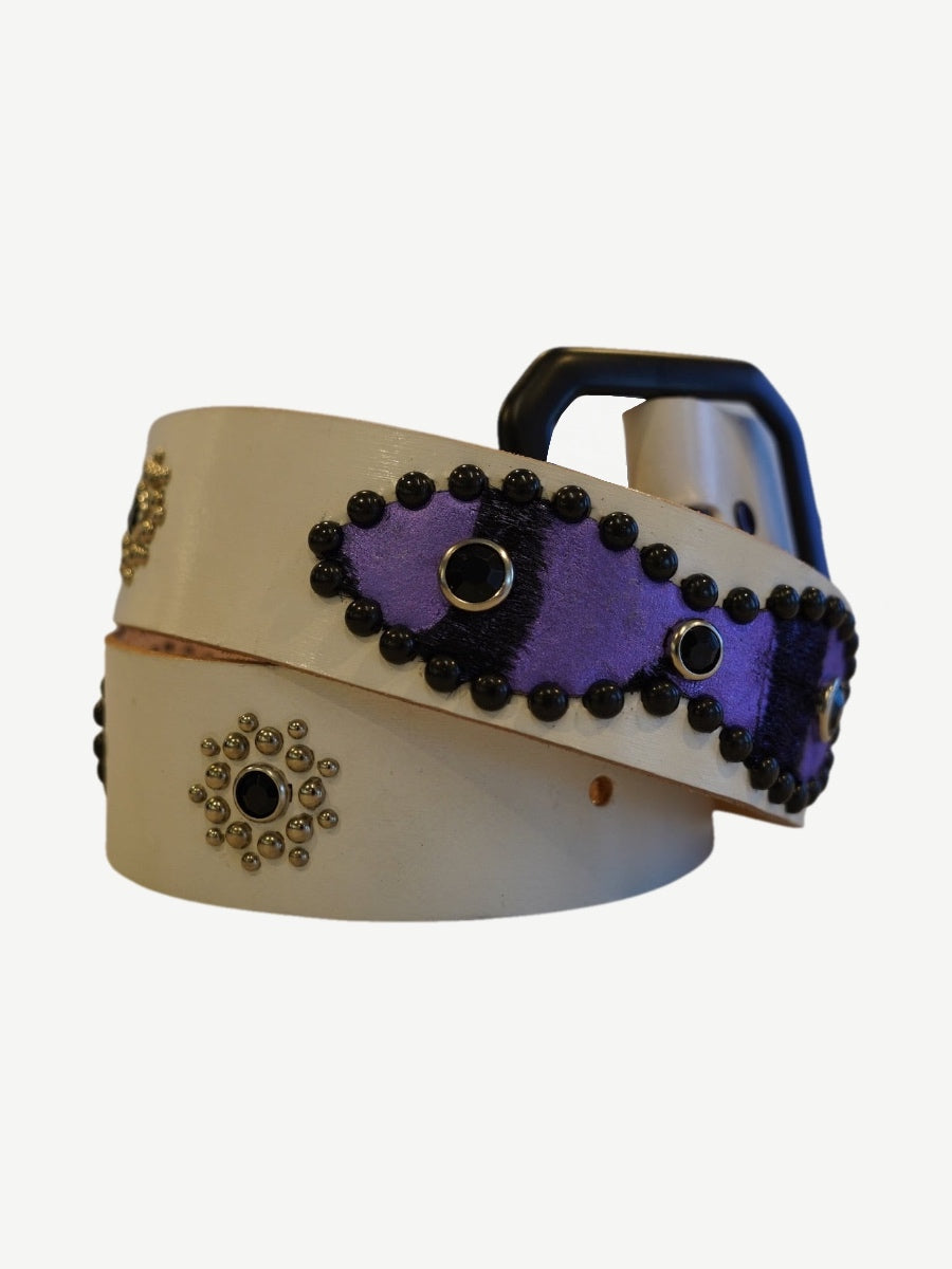 Vintage white leather belt coiled with purple suede inlay panels, black bead studs and silver flower medallions