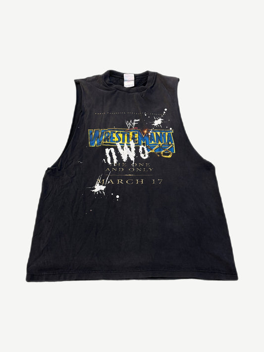 Vintage WWF Wrestlemania NWO cutoff sleeveless tee in faded black with yellow Wrestlemania logo print