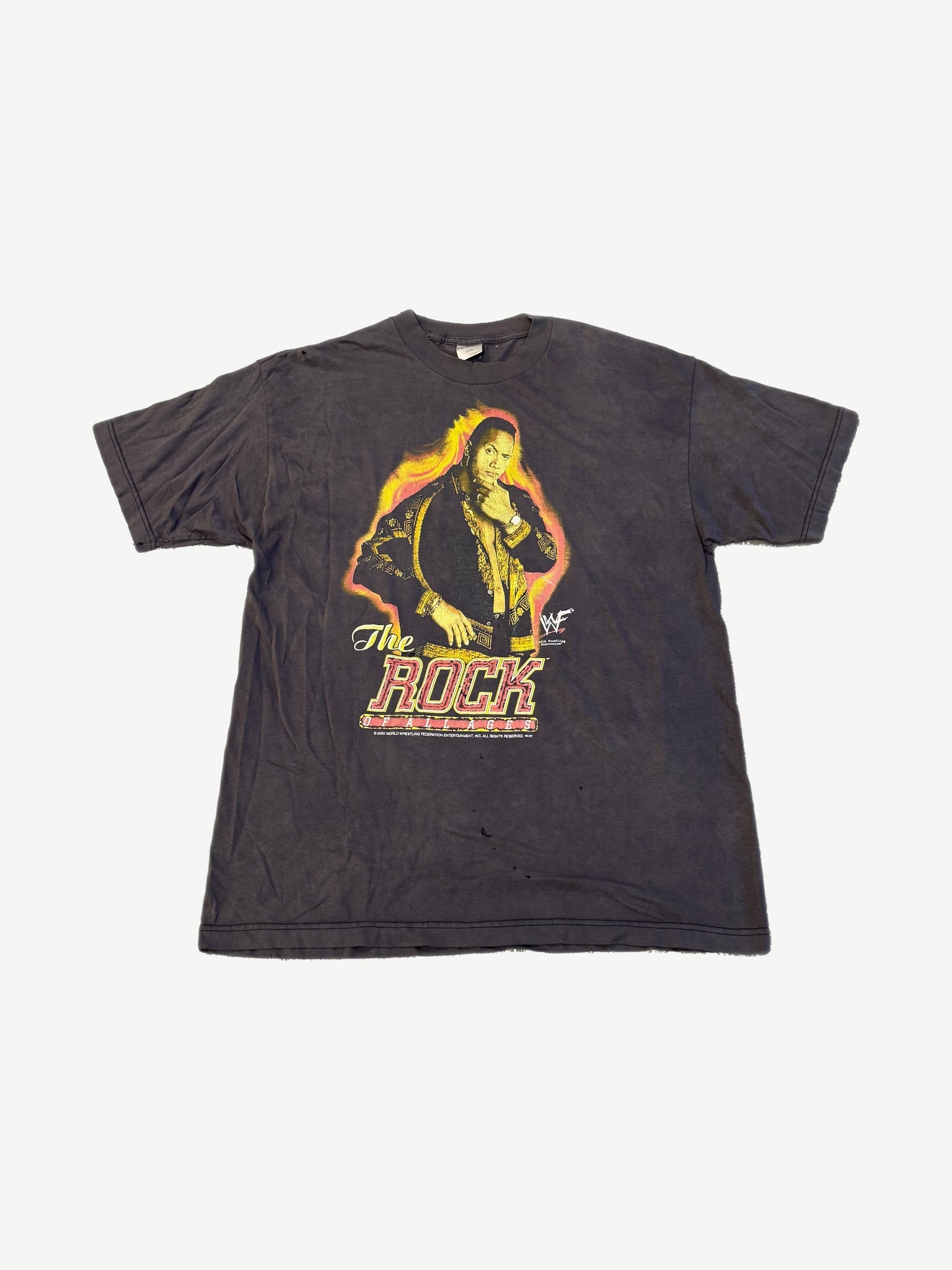 Vintage WWF The Rock tee in faded black with photo print of The Rock and flame-style logo lettering